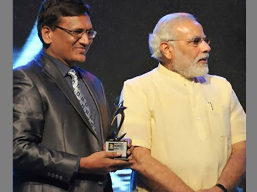 Ashok Mittal being honoured by Shri Narendra Modi